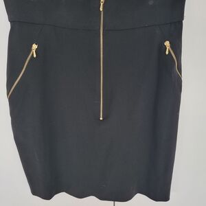 CHANEL Black Pencil Skirt with Gold Zipper Accents